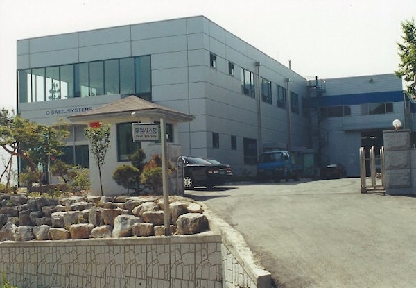 Company History - Built new HQ and 1st factory(2000)